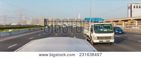Dubai, Uae February 20, 2018: The Cars And Trucks On The Highway