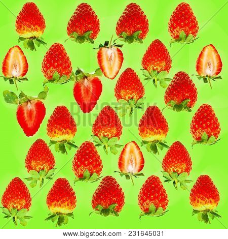 A Dense Pattern Of Fresh Juicy Strawberries On Green Background