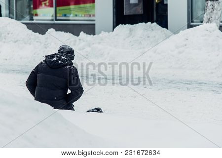 Homeless Man Begs For Alms Knees In The Snow