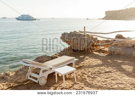 Half Turn View Chaise Longues On The Beach Beach Chaise Longues
