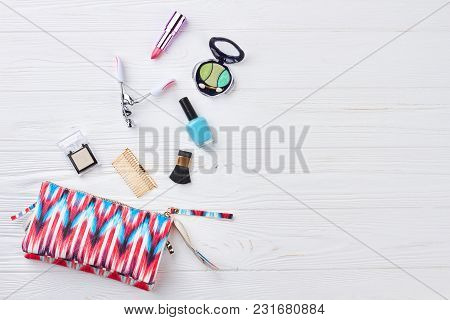 Cosmetic Bag And Makeup Objects. Flat Lay Of Pink Cute Woman Bag Open Out With Cosmetics And Accesso