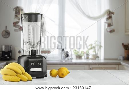 Metal Food Blender Close-up With Fresh Exotic Tropic Fruits Next To It On Kitchen Background With Em