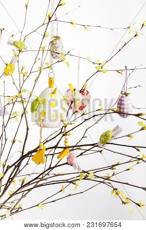 Composition Of Branches With Young Leaves And Green Buds, Decorated For Easter With Easter Eggs, Hea