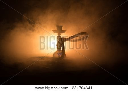 Hookah Hot Coals On Shisha Bowl With Black Background. Stylish Oriental Shisha. Shisha Concept