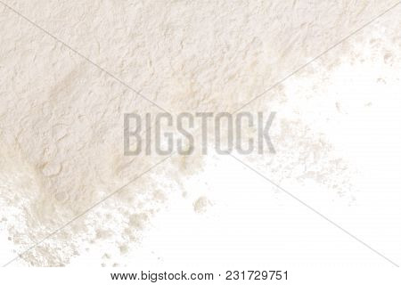 Pile Of Flour Isolated On White Background With Copy Space For Your Text. Top View. Flat Lay.