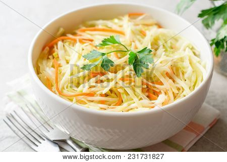 Fresh Coleslaw Salad In Bowl On Gray Stone Background.