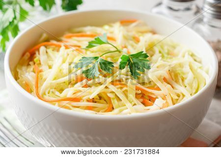 Fresh Coleslaw Salad In Bowl On Gray Stone Background.