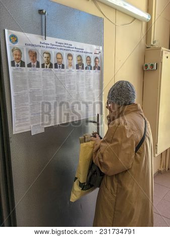 Moscow, Russia - March 18, 2018: Voters Examine The List  In The Elections Of President