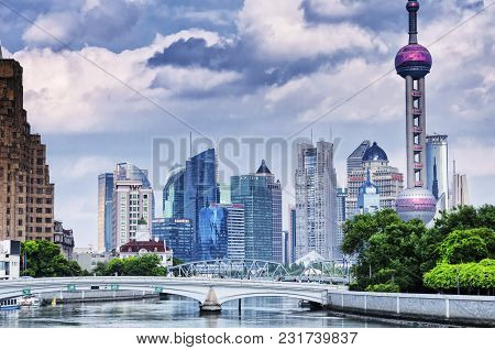 July 15, 2015.  Shanghai, China. The Waibaidu (garden) And Huqiu Road Bridges Over The Wusong River 