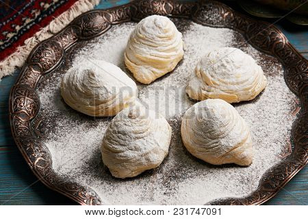 Badambura Powdered Pastry On Novruz Tray. Azerbaijan Traditional Pastry Cookie Badambura On Rustic T