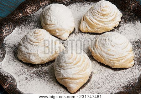 Badambura Powdered Pastry On Novruz Tray. Azerbaijan Traditional Pastry Cookie Badambura On Rustic T
