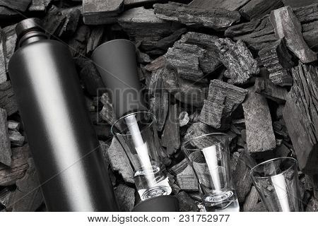 Black Set Of Matte Bottle Of Alcohol And Shot Glasses. On Charcoal Background. Black Edition.creativ