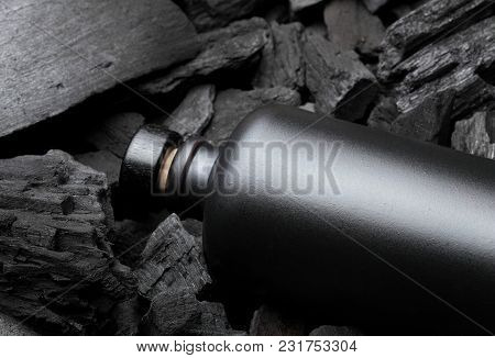 Original Black Matte Bottle Of Vodka Or Tequila Or Other Liqueur.on Charcoal Background. Black Editi