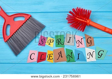 Brushes For House Cleaning On Wooden Background. House Cleaning Set On Wooden Background. Cut Out Pa