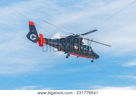 Fecamp-france, September 16,2017 - Non Foucus Scene Display Coast Guard Of Helicopter In Flight Read