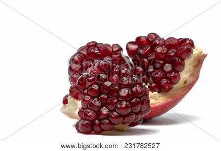 Pomegranate Grains Isolated On White Background. Clseup