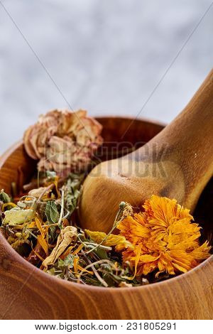 Spa Still Life With Flowers In Wooden Bowl On Light Textured Background, Top View, Close-up, Selecti