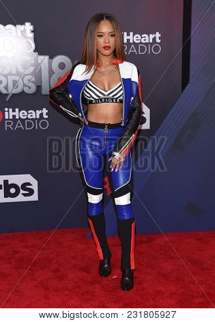 LOS ANGELES - MAR 11:  Serayah McNeil arrives for the 2018 iHeartRadio Music Awards on March 11, 2018 in Los Angeles, CA                