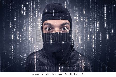 Burglar in action with encoded concept and his tools in his hand. 