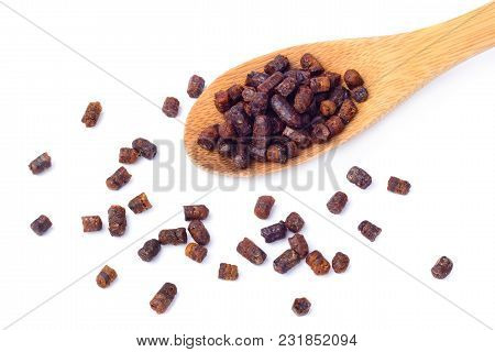Granules Of Bee Bread In A Wooden Spoon Are Isolated On A White Background. Apitherapy. Beekeeping P