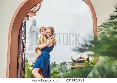 Happy Tourists Mom And Son In Pagoda. Travel To Asia Concept. Traveling With A Baby Concept.