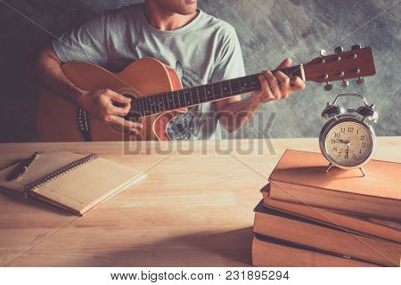 Relaxing Time  With A Man Playing Guitar