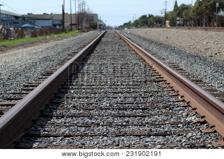 Train Railroad Tracks At A Poor Neighborhood