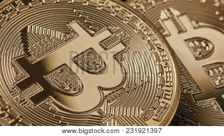Gold bitcoins new modern currency for bitcoin payments, close up shot