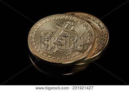 Stacked bitcoins the new modern currency for bitcoin payments on a black background
