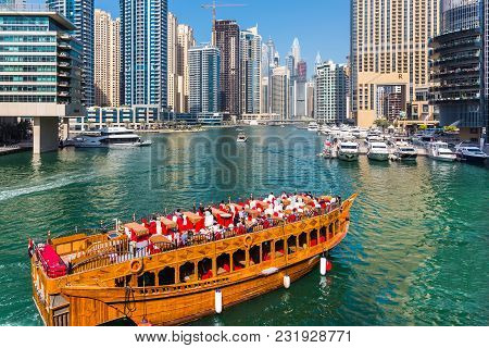 Dubai, Uae February 17, 2018: Tourist Wooden Ship In Dubai Marina Bay On A Sunny Summer Day