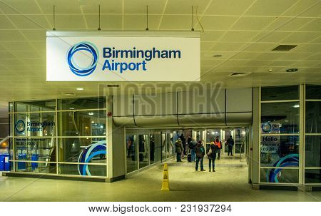 Birmingham , United Kingdom - March 02 2018 : Passengers In Airport At Night In Birmingham, United K