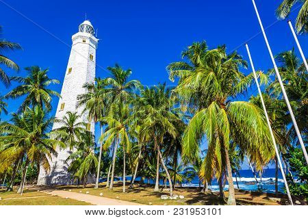 Beautiful Beach And Lighthouse In Sri Lanka In Sunny Day