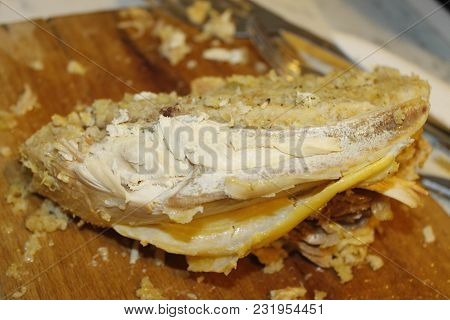 Homemade Stuffed Capon On Wooden Cutting Board