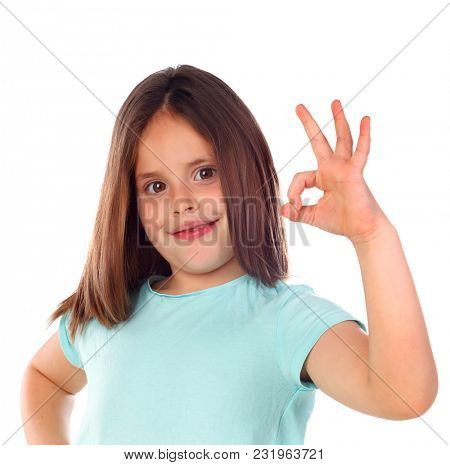 Friendly child saying Ok with her hand isolated on a white background