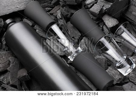 Black Set Of Matte Bottle Of Alcohol And Shot Glasses. On Charcoal Background. Black Edition.creativ