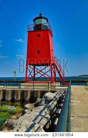 Charlevoix Michigan on Lake Michigan is a beautiful vacation destination.  The Charlevoix South Pier Light Station is a historical landmark and popular tourist attraction.