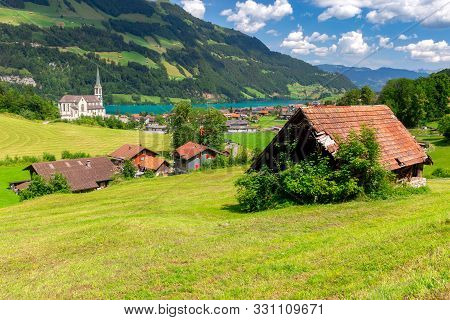 View Of The Traditional Medieval Alpine Village On A Sunny Day. Lungern Switzerland.