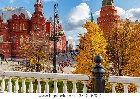 Moscow, Russia - October 08, 2019: Manezhnaya Square In Autumn Against Yellow Trees At Sunny Day. Ma