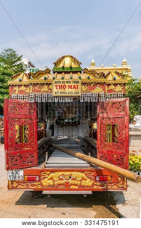 Da Nang, Vietnam - March 10, 2019: Look In Bakc Of Van Rebuilt As Gold-red Hearse With Elaborate Dec