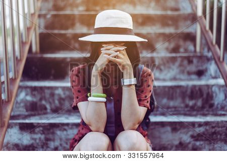 Suicide Prevention Concept,depressed Young Asian Woman Sitting On A Bridge Near Railway At Train Sta