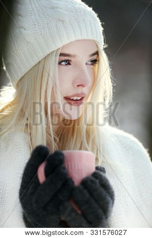 Beautiful Girl Drinking Coffee Or Tee Outdoors