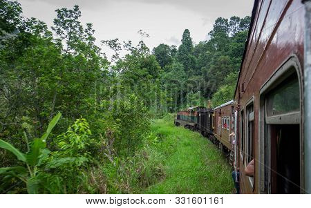 Ella/ Demodara, Sri-lanka: August 08/ 2019: The Local Train Acrossing The Nine Arches Demodara Bridg