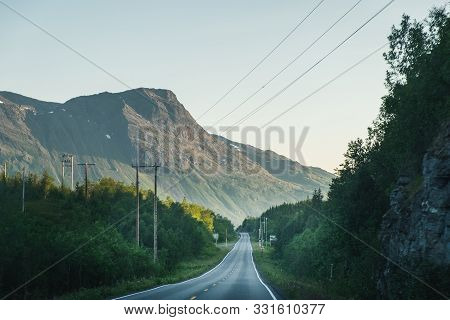 View Through The Car Window To Empty Road And Natural Landscape In Narvik Municipality, Nordland Cou