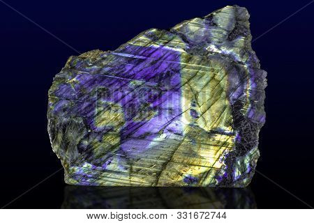 Beautiful Shiny Labradorite Gemstone On Dark Background