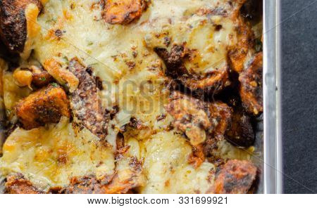 Fried Potato Fries Coated  Topped With Mature Cheddar And Monterey Jack Cheeses, Jalapeno And Bacon