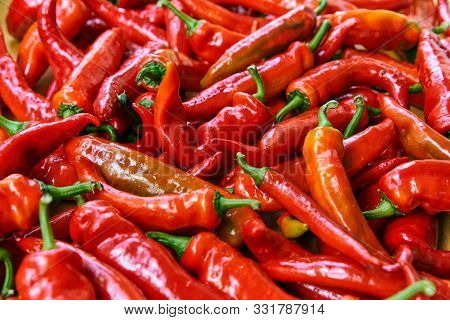 Red Hot Chilli Peppers Pattern Texture Background. Close Up. Landscape. A Backdrop Ofred Hot Chilli 