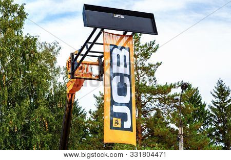 Samara, Russia - September 15, 2019: Dealership Flag Jcb Tractor At The Annual Volga Agro-industrial