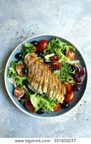 Grilled Chicken Breast With Vegetabe Salad. Top View With Copy Space.