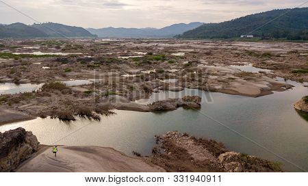 Man Exercise In The Mekong River In The Aerial View