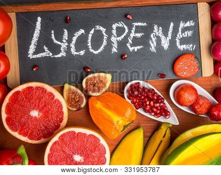 Fruits And Vegetables Containing Lycopene. Healthy Vegan Food Background. Lycopene Is A Red Caroteno